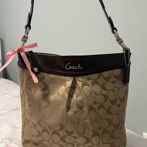 Coach Brown Signature Shoulder Bag with Pink Bow Accent